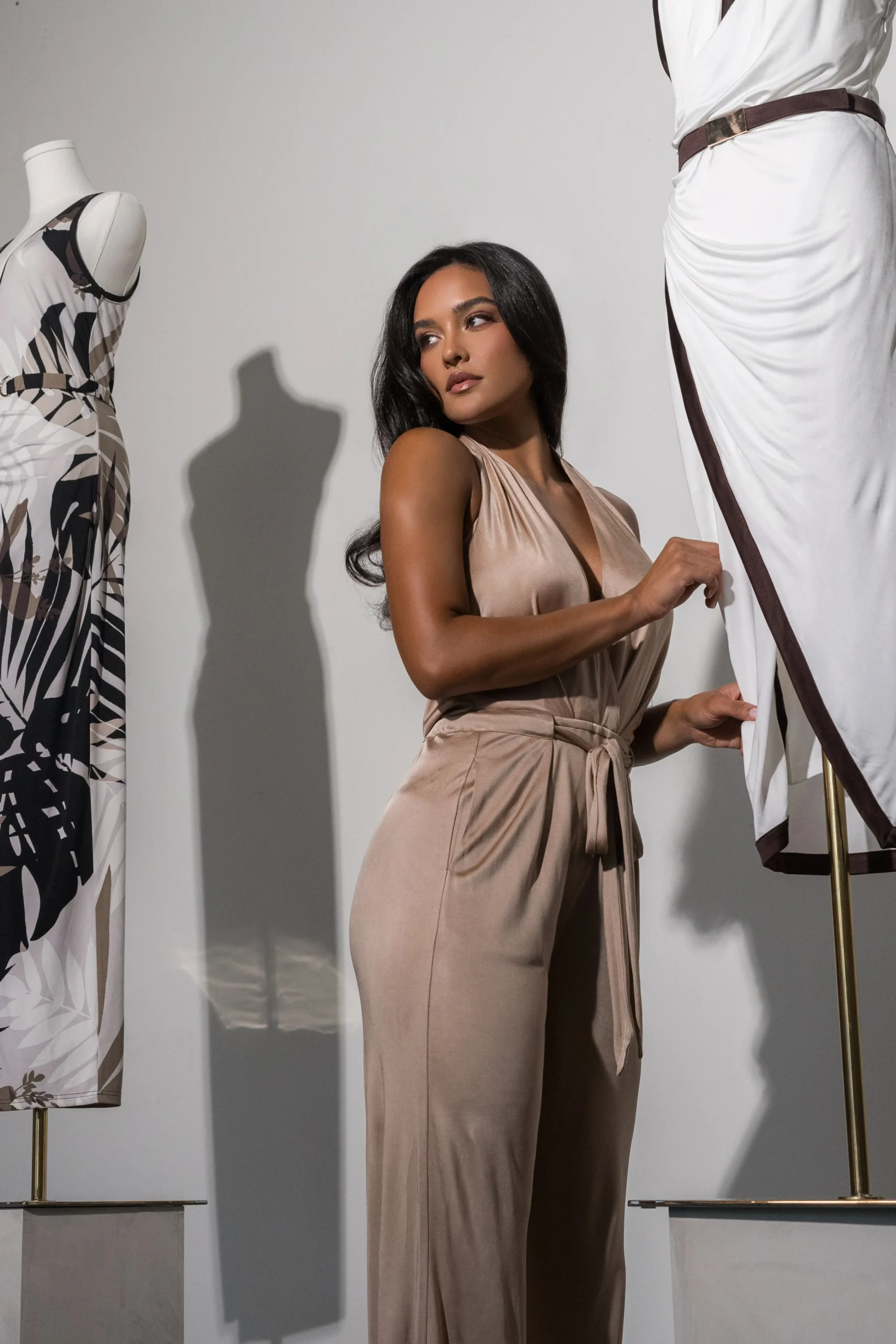 beige_slinky_halter_belte_10.webp JLUXLABEL Beige Slinky Halter Belted Jumpsuit