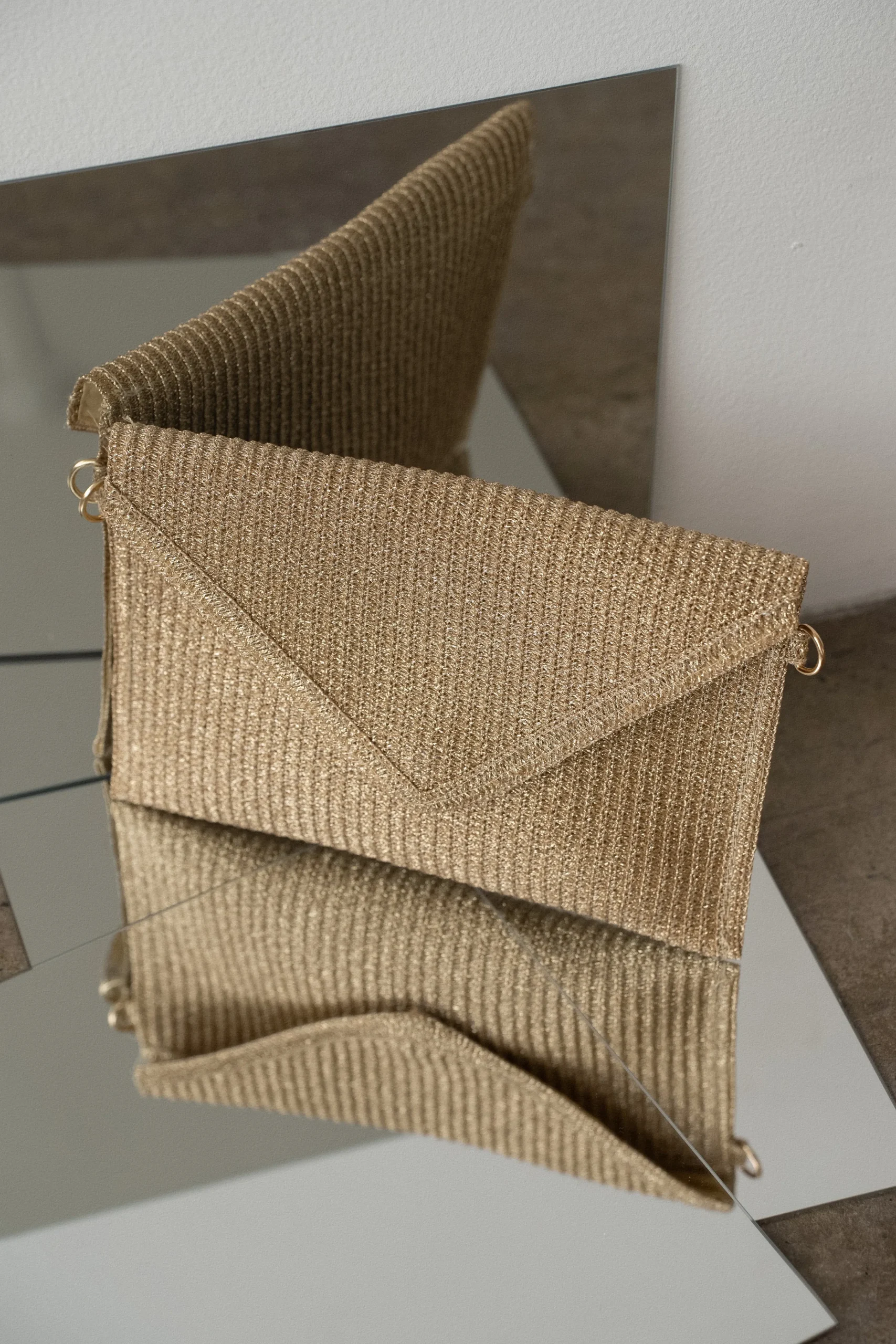 gold_envelope_woven_clutc_1.webp JLUXLABEL Gold Envelope Woven Clutch